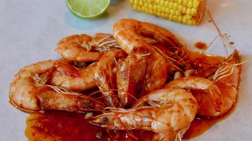 Louisiana Cajun Shrimp · 1 lb. whole shrimp tossed in butter, fresh chopped garlic, Cajun spices and Louisiana sauces. Served with Corn on the Cob and steamed rice.