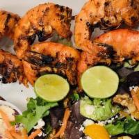 Grilled Shrimp Skewers · Marinated With Lime And Spices. Juicy, Flavor-Packed Shrimps Skewers (6 Jumbo Shrimp) Served...