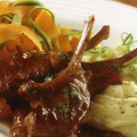 Lamb Chops · Australian lamb racks (3 pieces) marinated with herbs, spices, and charbroiled over an open ...