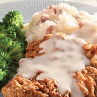 Chicken Fried Steak With Country Gravy · Breaded Beef Fritters (8oz) Deep Fried And Served With Loaded Country Gravy. Pick Any Two Si...