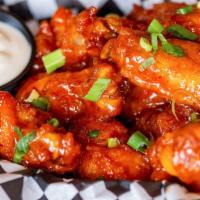 Chicken Wings · Chicken wings deep-fried and coated in a choice of any one sauces from buffalo hot wings, ga...