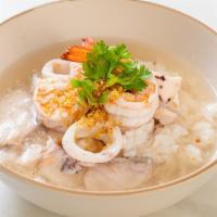 Sizzling Rice Soup · Yummy rice soup made with shrimp, chicken, snow pea and carrot.
