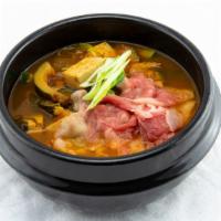 Pork with Mustard Green Soup · Yummy soup with salted egg, pork, and mustard green.