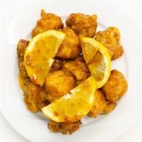 Lemon Chicken · Zesty lemon chicken is crispy battered chicken breast pieces smothered in a sweet and tangy ...
