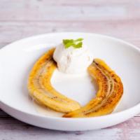 Fried Banana with Ice Cream · Yummy fried banana topped on vanilla ice cream.