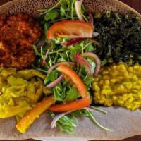 13.  Shewhat Veggie Combo · Red lentils, yellow lentils, greens and alachi house salad.
