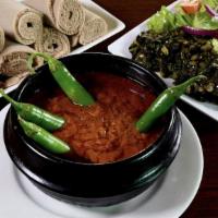 16.  Shiro · Shewhat house-spiced ground chickpeas, served with taita.
