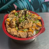 Chicken Bites & Rice · Our chicken bites drizzled with our house made aioli sauce and sprinkled with furikake on wh...