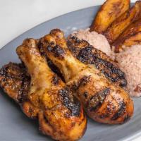 Jerk Chicken · Served w/ Rice and Beans and Fried Plantains