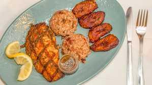 Jerk Salmon · Served w/ Rice and Beans & Fried Plantains