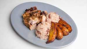 Jerk Pork · Served w/ Rice and Beans and Fried Plantains