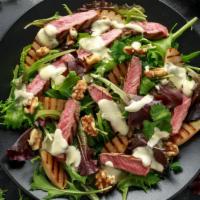 Steak Margarita Salad · Healthy Margarita salad prepared with marinated steak strips, romaine lettuce, jicama, red a...