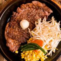 Angus Ribeye Steak · Topped with Carrots, Green Beans, Corn, Bean Sprouts, Garlic Butter.