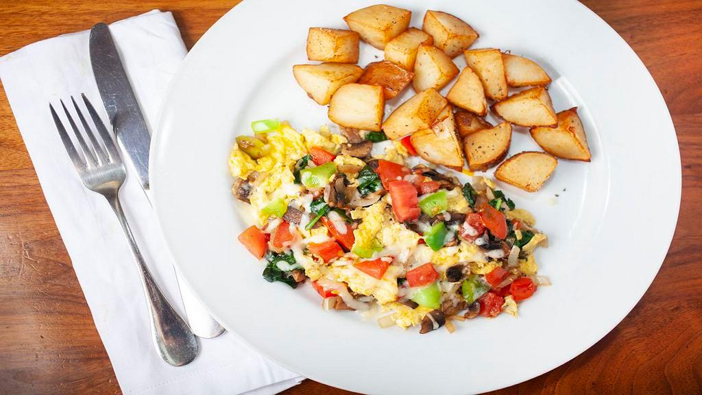 Farmers Scramble · Three egg scramble with bacon, mushrooms, onions, and spinach. Served with home fries