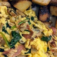 Village Scramble · Three egg scramble with bell peppers, mushrooms, avocado, spinach, and Jack cheese with home...