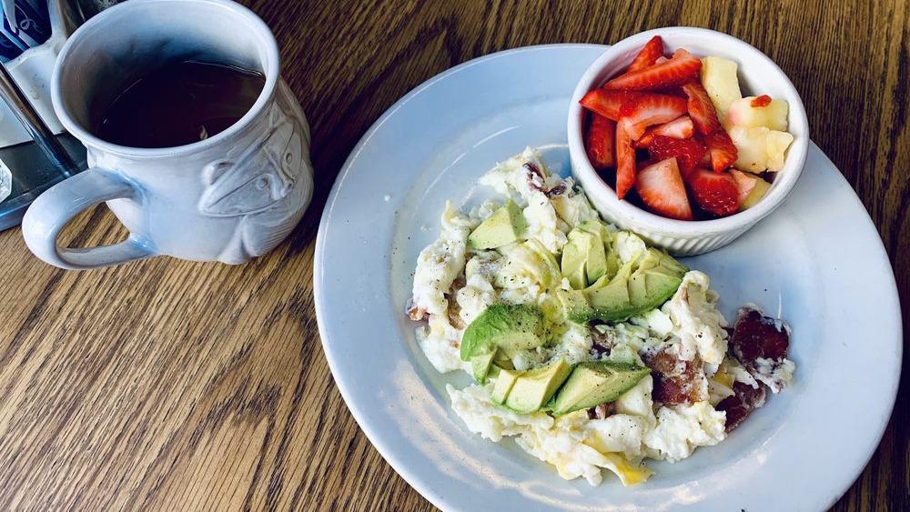 The Strong Start · Four egg whites scrambled with diced bacon and avocado. Served with a cup of fresh fruit.