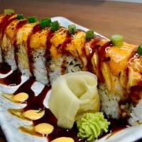 Lion King · Inside: imitation crab, avocado, cucumber. Outside: baked salmon with spicy mayo and unagi s...