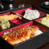 Salmon Teriyaki Bento Box · Served With Salmon, Rice, Salad , California Rolls ,Miso Soup,  and Tempura