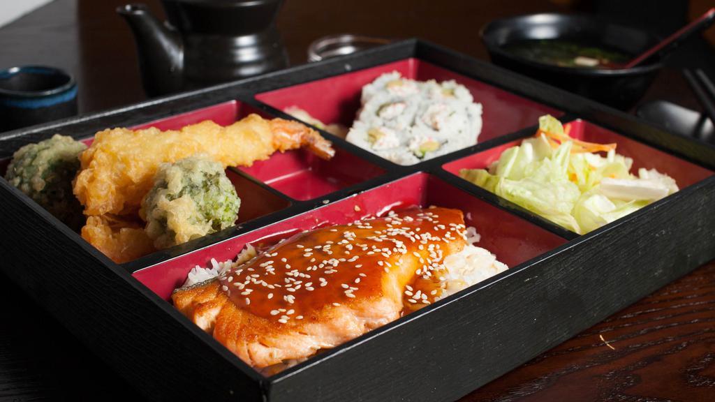Salmon Teriyaki Bento Box · Served With Salmon, Rice, Salad , California Rolls ,Miso Soup,  and Tempura