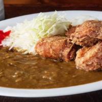Karaage Curry · Slow Cooked Famous Japanese Curry Served Over Our Famous Chicken Karaage .  Served With Miso...