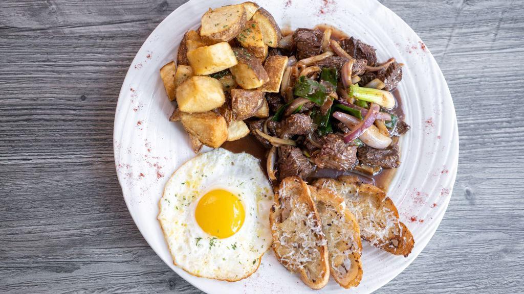 BO LUC LAC  · Angus Tenderloin Dice-Cut, Onions, Stir-Fried in Hoisin Sauce, Served with Fried Potatoes, Egg Sunny Side Up, Garlic Toast