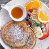 CLASSIC PANCAKE  · Pancake flour, syrup, Served with Seasonal Fruit **