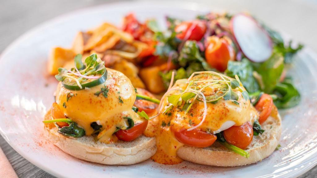 FLORENTINE BENEDICT  · Two Poached Eggs, Spinach, Tomatoes, English Muffin, Curry Hollandaise Sauce, Fried Potatoes, Choice of House Salad or Seasonal Fruit (+$1)