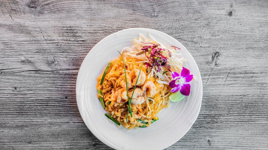 PAD THAI  · Fresh rice noodle stir fry with egg, dry shrimp, dry daikon, bean sprout, chive, tofu, and tamarind sauce served with fresh lime and bean sprout.
Choice of Chicken, Shrimp or Tofu