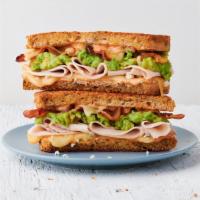 The Thursday · Roasted turkey, bacon, muenster cheese, blue cheese crumbles, avocado spread & Society Sauce...