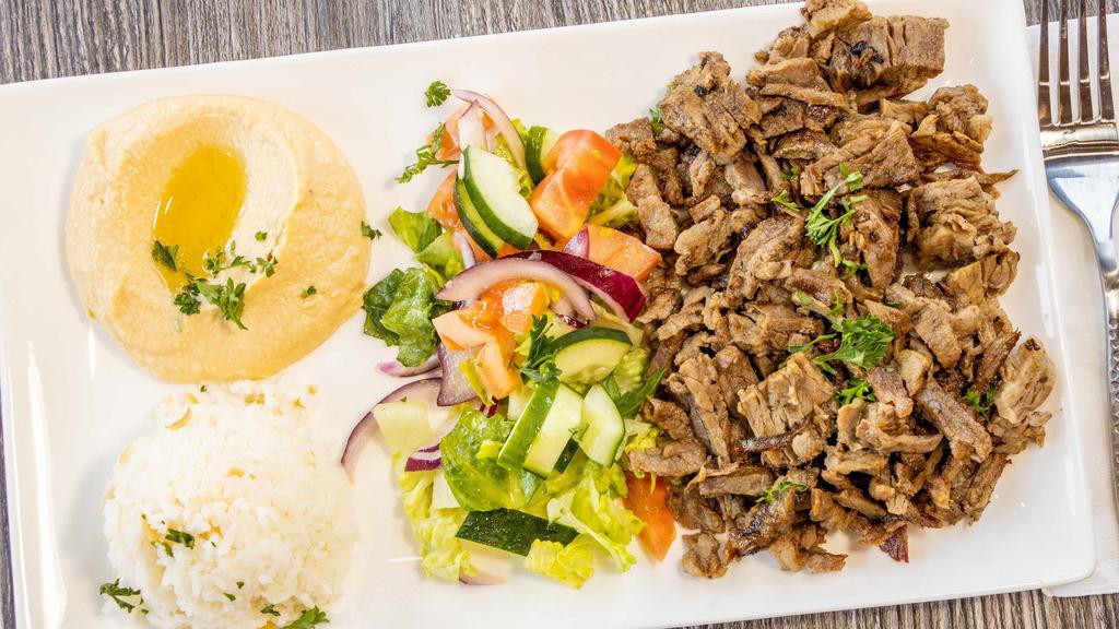 Beef & Lamb Gyros Plate · Slow cooked thinly sliced lamb.