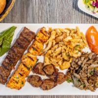 Truva Special Mix Grill · Assortment of lamb adana kebab, lamb and beef gyro, chicken gyro, chicken kebab and lamb shi...