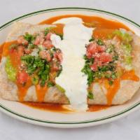 Macho Burrito · A super sized Super Burrito for a large appetite!!Your choice of meat, rice, beans, cheese, ...