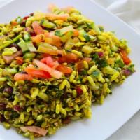 Hara Bhara Bhel · Puffed rice mix with cucumber, tomato and sprouts, crispy wafers, chickpeas and chutney.