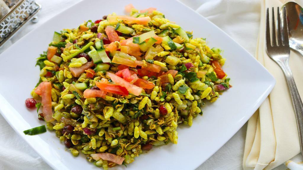 Hara Bhara Bhel · Puffed rice mix with cucumber, tomato and sprouts, crispy wafers, chickpeas and chutney.