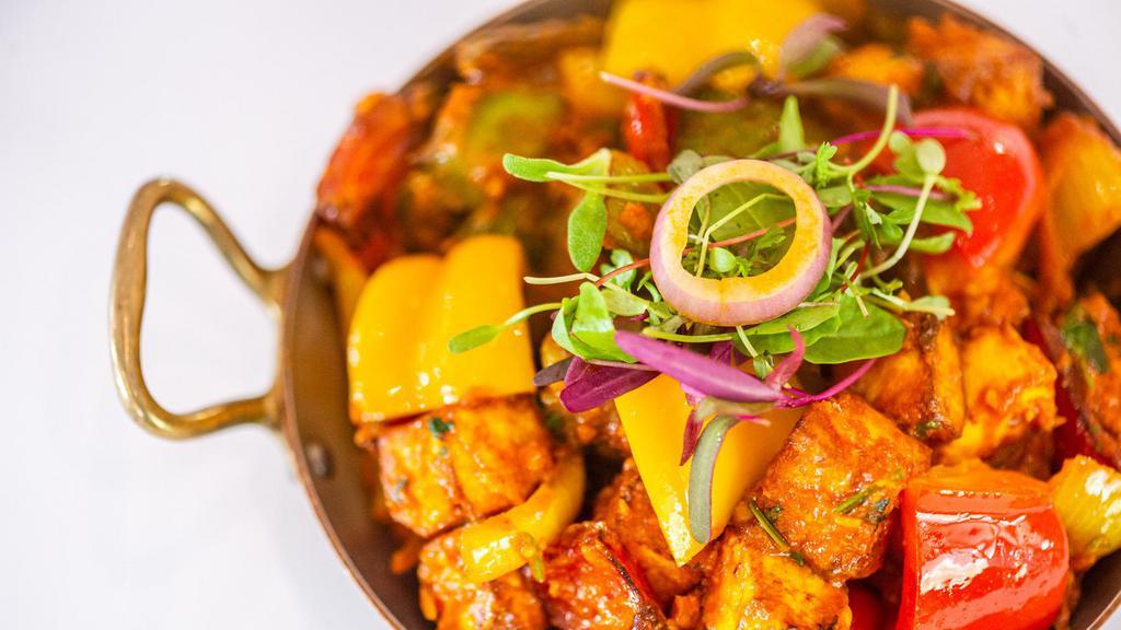Chili Paneer · Homemade cheese cooked with bell pepper, ginger, garlic and herbs.