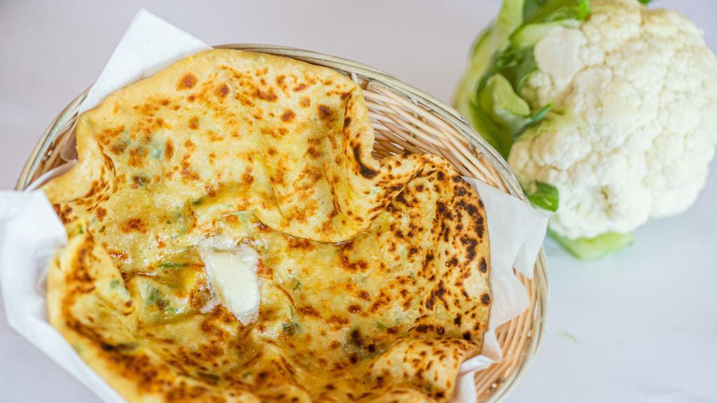 Gobi Paratha · Pan cooked whole wheat bread stuffed with cauliflower and spices.