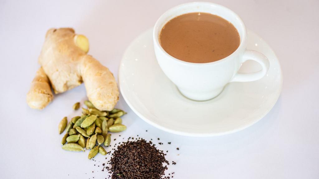 Tea · Traditional Indian tea made with milk, cardamom and Indian herbs.