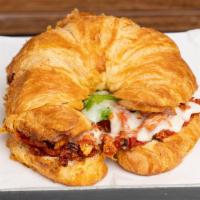 Sundried Tomato Provolone Croissant · Sundried tomaoes, provolone cheese and spinah toasted on a Garlic Butter Croissant