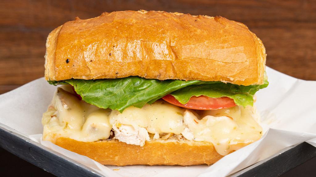 Chicken Garlic Sandwich · Grilled chicken breast on a warm toasted dutch crunch roll spread with garlic butter. garnished with lettuce tomato mayonnaise and pepper jack cheese.