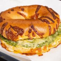 Pesto Bagel Sandwich · A warm Cheddar Bagel, with Pesto Sauce, and Parmesan Shredded Cheese, toasted to perfection!