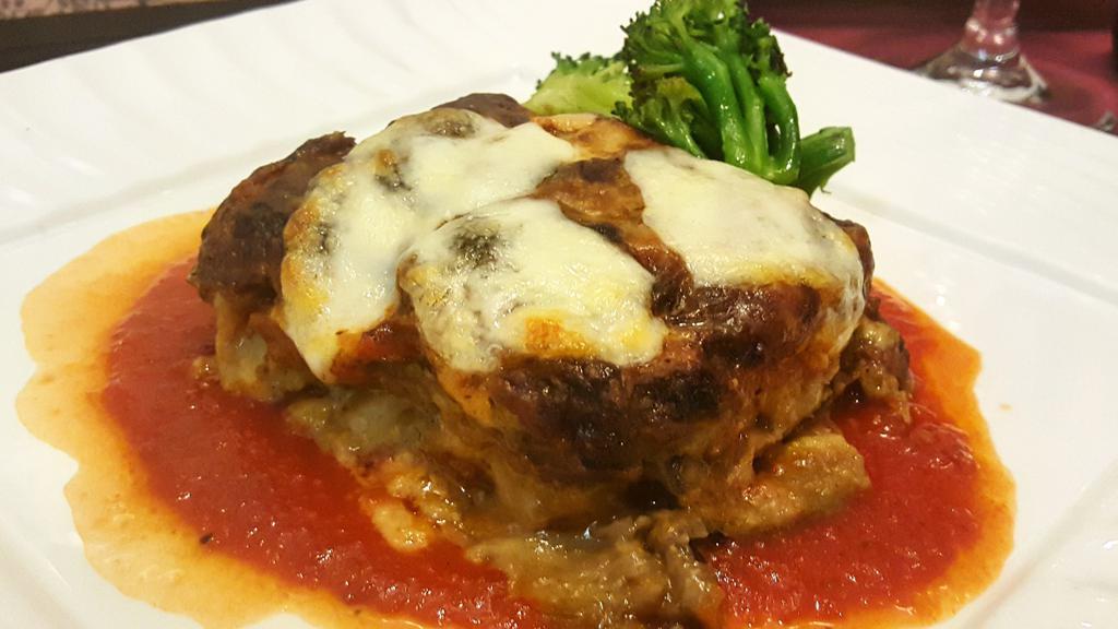 Parmigiana di Melanzane / Eggplant Parmesan · Vegetarian. Eggplant slices dipped in eggs and flour, fried and layered with our fresh tomato sauce, imported Italian mozzarella cheese and Italian Parmesan cheese. Served with sautéed broccoli.