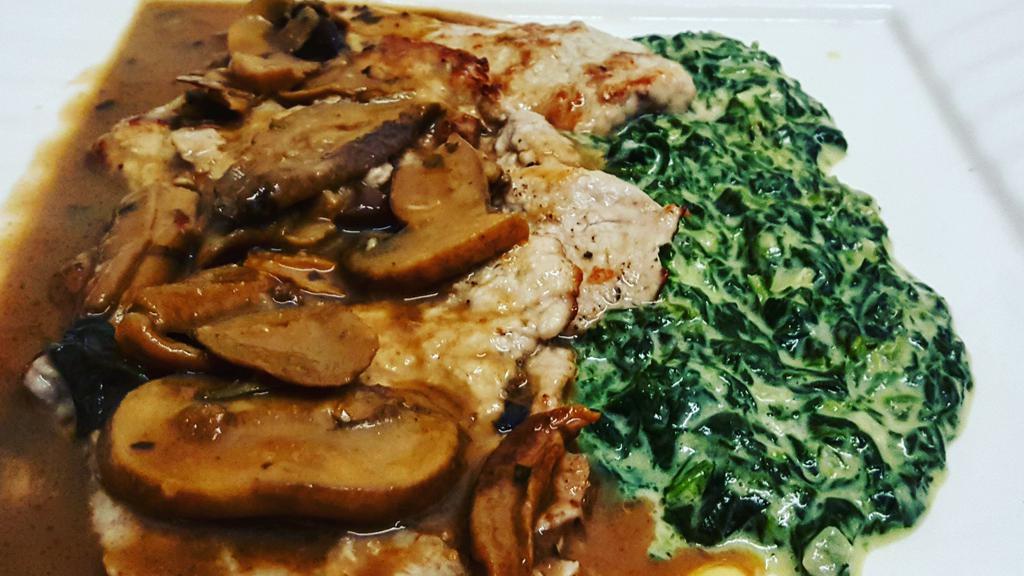 Scaloppine Di Vitello / Veal Scaloppini  · Veal scaloppini lightly dusted in seasoned flour, cooked with a tasty Marsala wine reduction and mushroom sauce. Served with Parmesan creamed spinach.