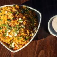 Vegetable Biryani · Fresh garden vegetables cooked with basmati rice and mild spice.