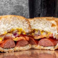 Polish Hound · Polish Sausage  on a French Roll with Mustard, Onions, Tomatoes