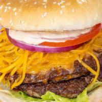 Double Happy Burger · Two 1/3 lb Patties with Lettuce, Tomato, Onion, and Pickle with Happy Sauce on a sesame seed...