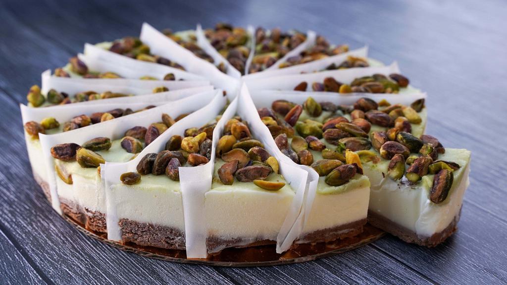 Tony Spumoni  · Pure almond gelato on a chocolate cheesecake crust. Topped with our special marzipan and roasted pistachios…Finalmenti Perfetto!