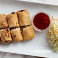 #3. Thai Spring Rolls · Vegetarian. Deep fried marinated vegetables and wrapped in a rice paper; served with sweet a...