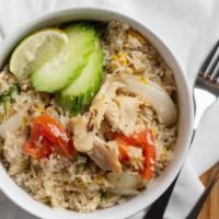 #73. Thai Fried Rice · Thai fried rice with egg, tomatoes and onions with your choice of: spicy basil fried rice wi...