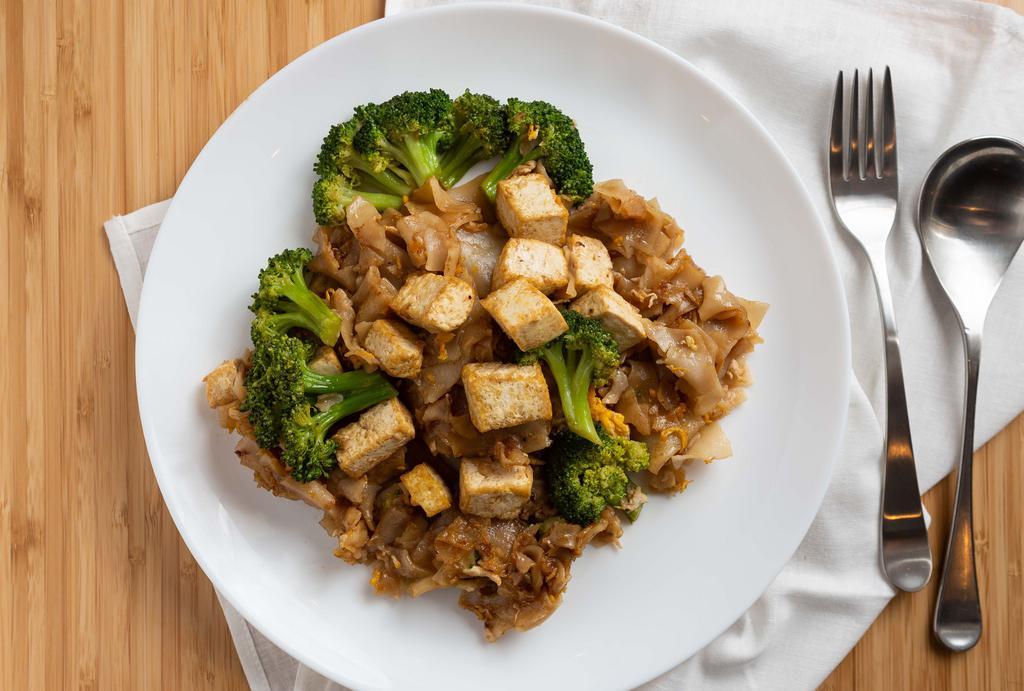 #68. Pad See Ew Tofu · Pan fried wide noodles with tofu, egg, broccoli, garlic and soy sauce.