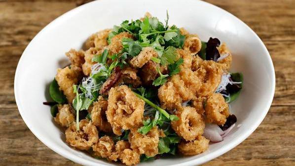 Crispy Calamari Salad · Mixed greens, vermicelli, red onion, cilantro, red curry honey.